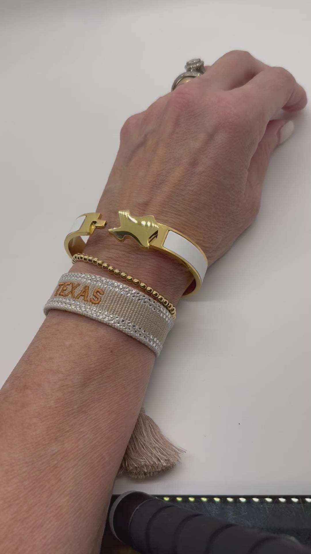 How to lock your bracelet.  Squeeze sides together to turn shape.